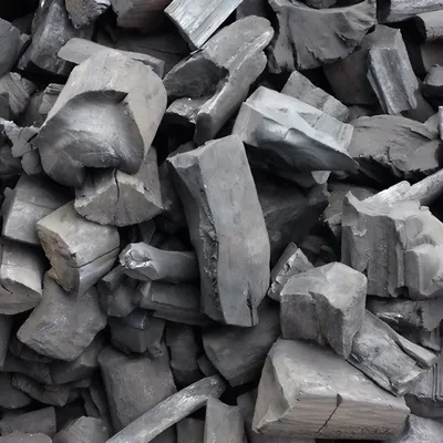Lumps of hardwood charcoal